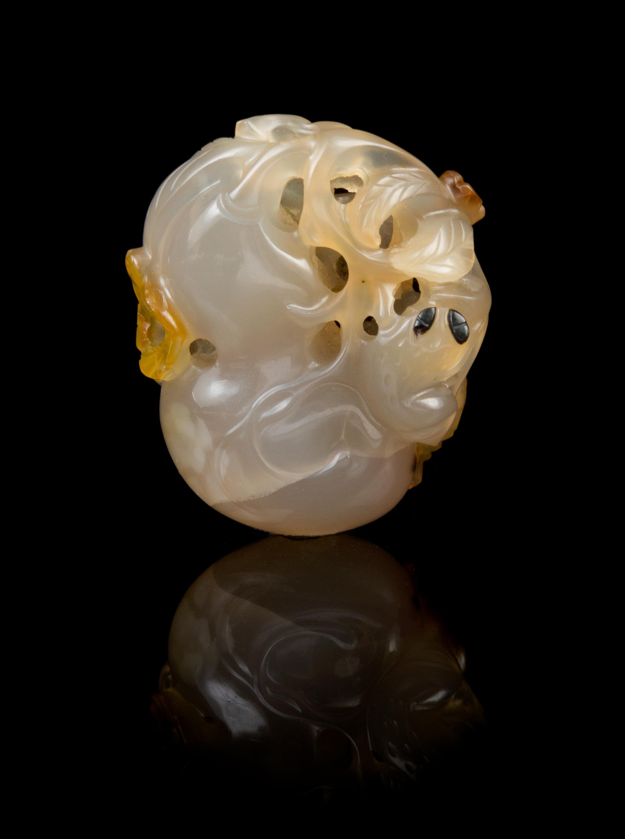 A Chinese Carved Agate Toggle SUZHOU SCHOOL, 18TH/19TH CENTURY Length 1 7/8 inches. — SUZHOU SCHOOL, 18TH/19TH CENTURY