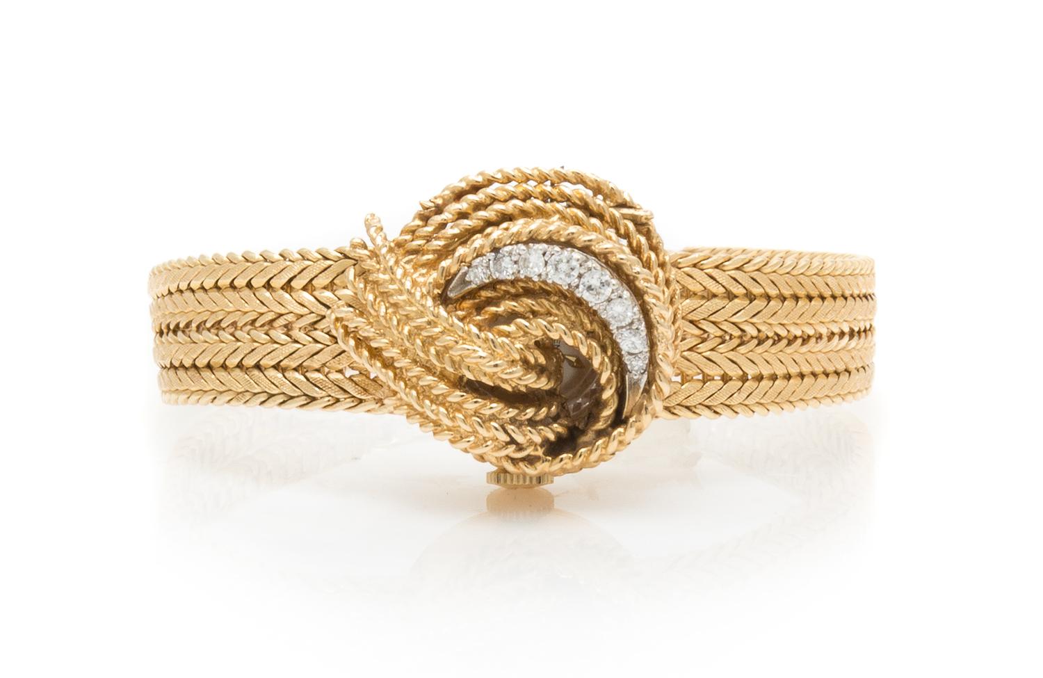 A 14 Karat Yellow Gold and Diamond Surprise Wristwatch, Lucien Piccard, 19.10 dwts.