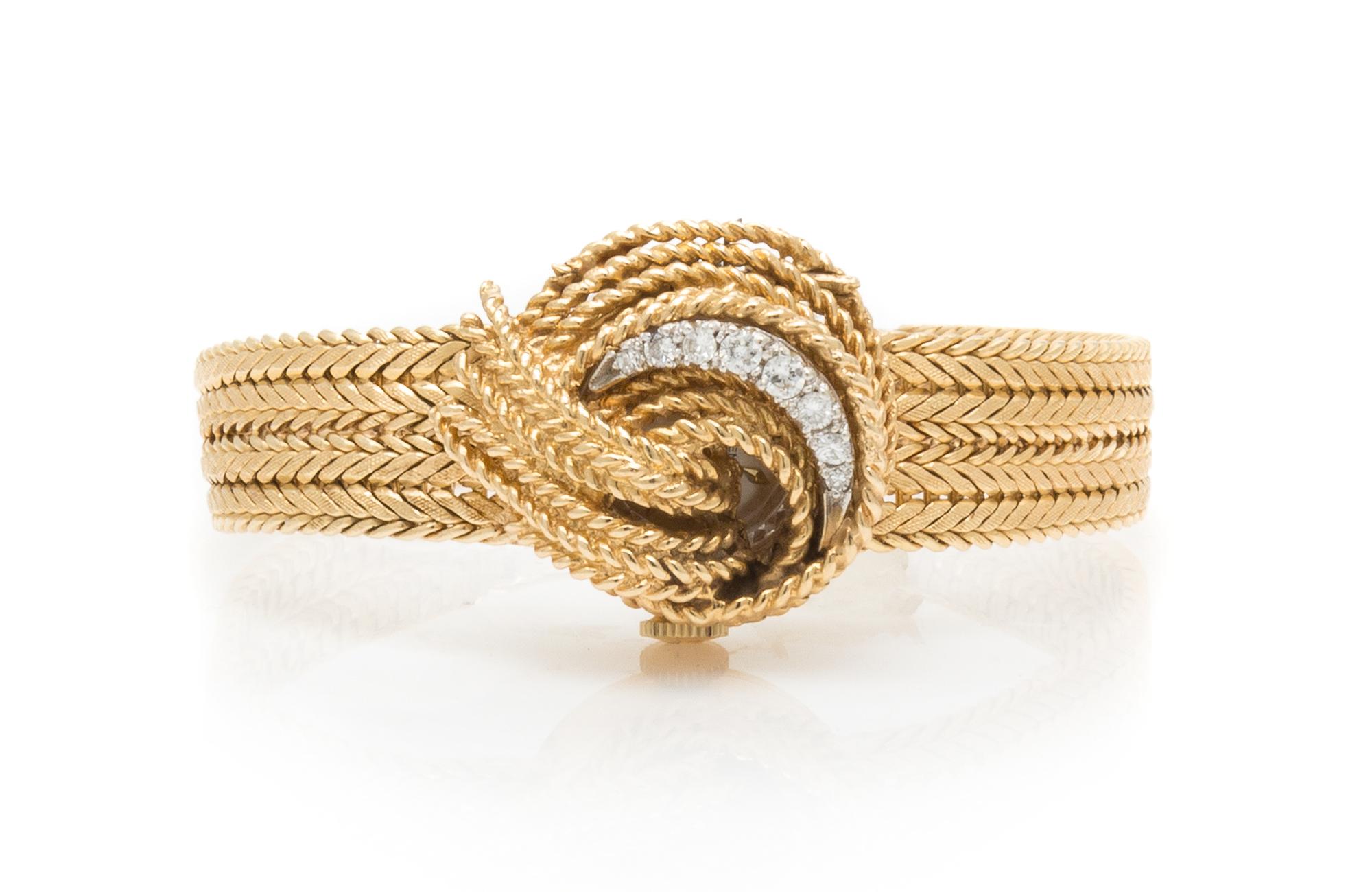 A 14 Karat Yellow Gold and Diamond Surprise Wristwatch, Lucien Piccard, 19.10 dwts.