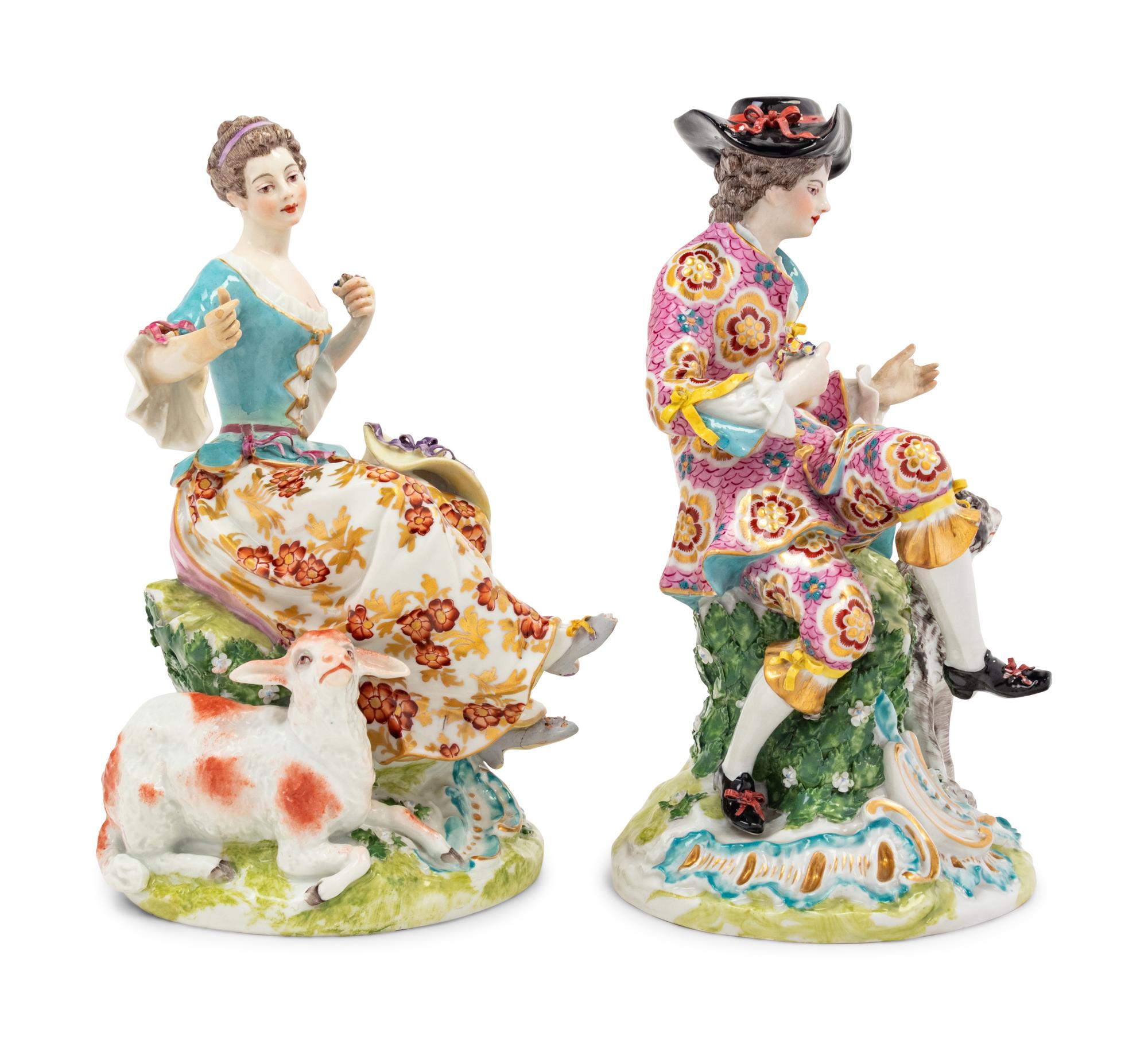 A Pair of Chelsea Porcelain Figural Groups
