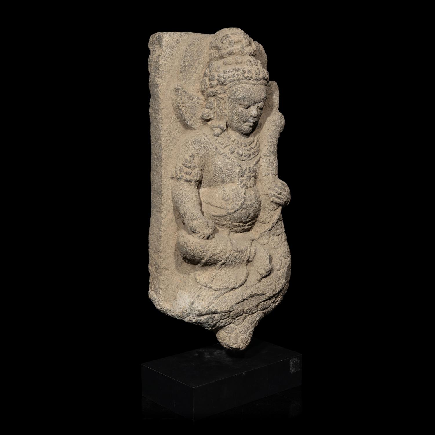 An Indonesian Volcanic Stone Figure of Kumara, Central Java, 10th Century