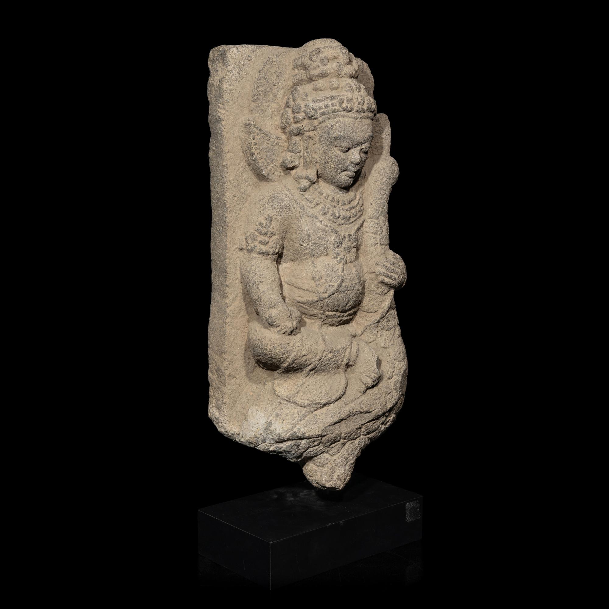 An Indonesian Volcanic Stone Figure of Kumara, Central Java, 10th Century