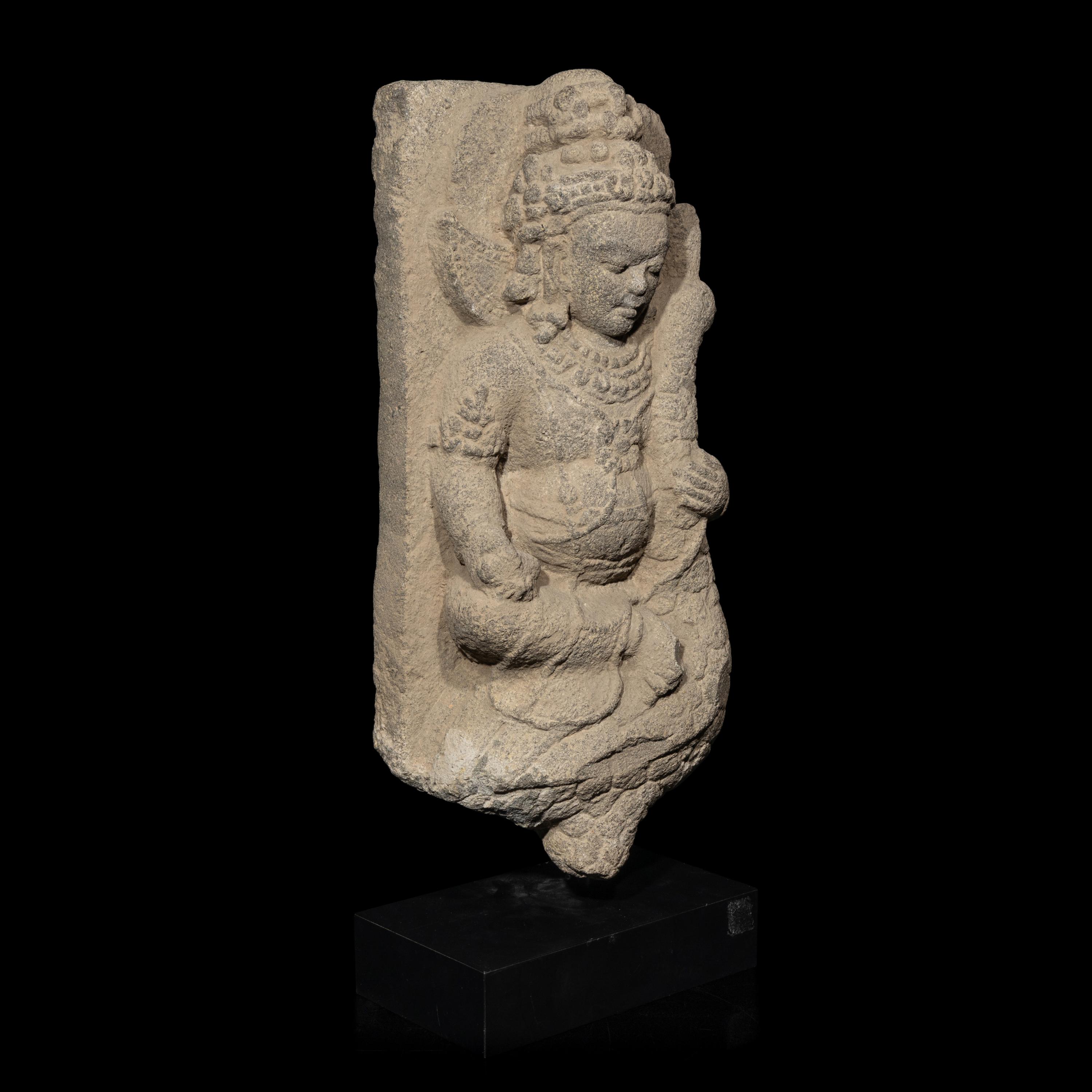 An Indonesian Volcanic Stone Figure of Kumara, Central Java, 10th Century