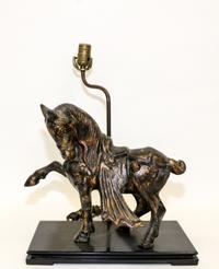 A Cast Resin Figural Table Lamp. Height 27 1/4 inches.