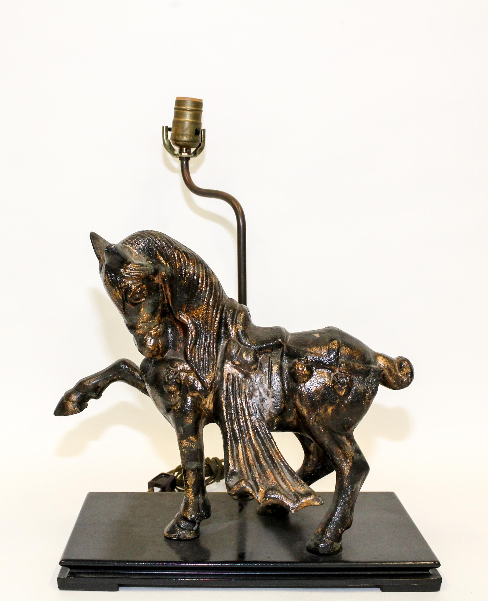 A Cast Resin Figural Table Lamp. Height 27 1/4 inches.