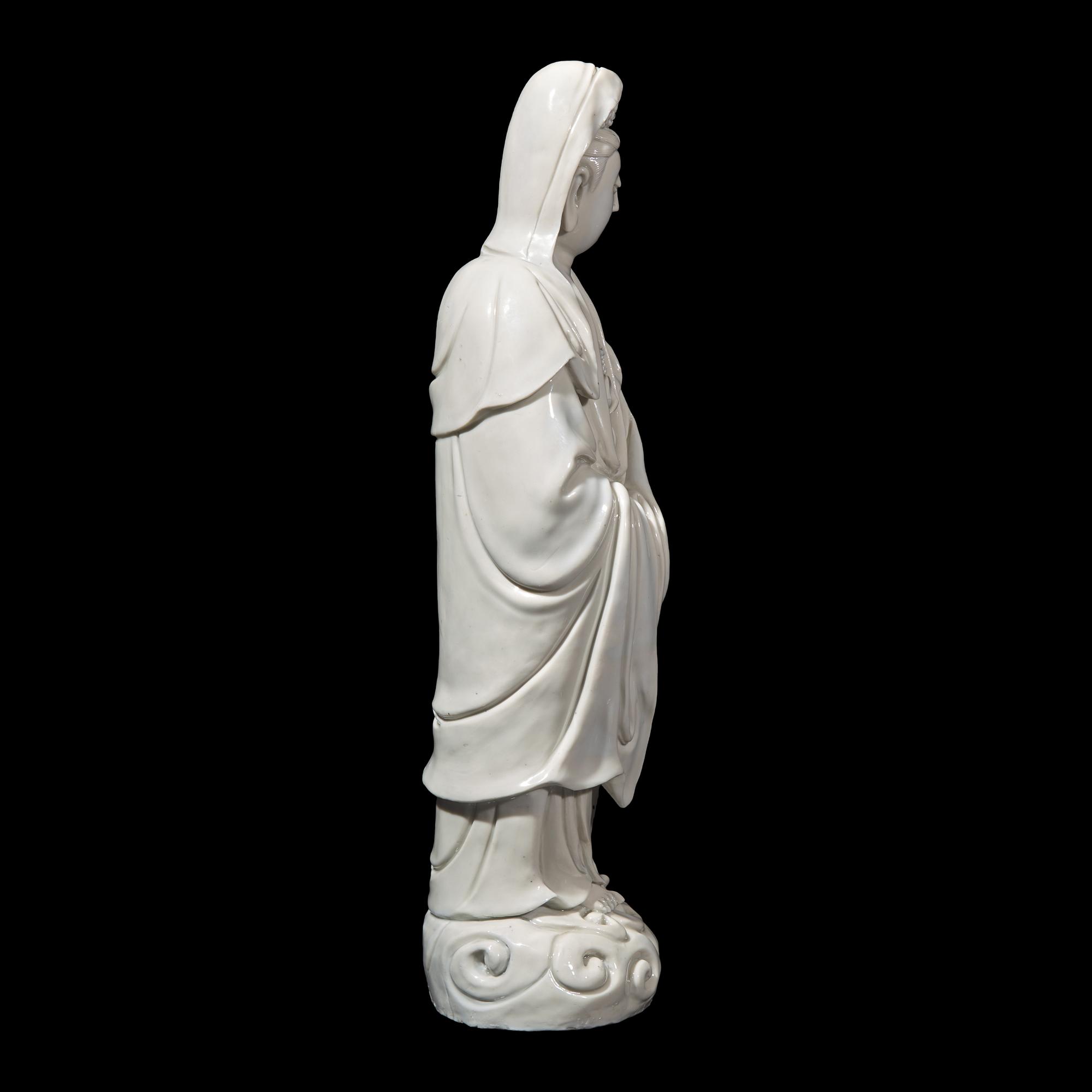 An Impressive Chinese Blanc de Chine Guanyin , Impressed Sunjiang Shanren M ark, 17th/18th Century 清早期 筍江山人款德化白瓷觀音立像