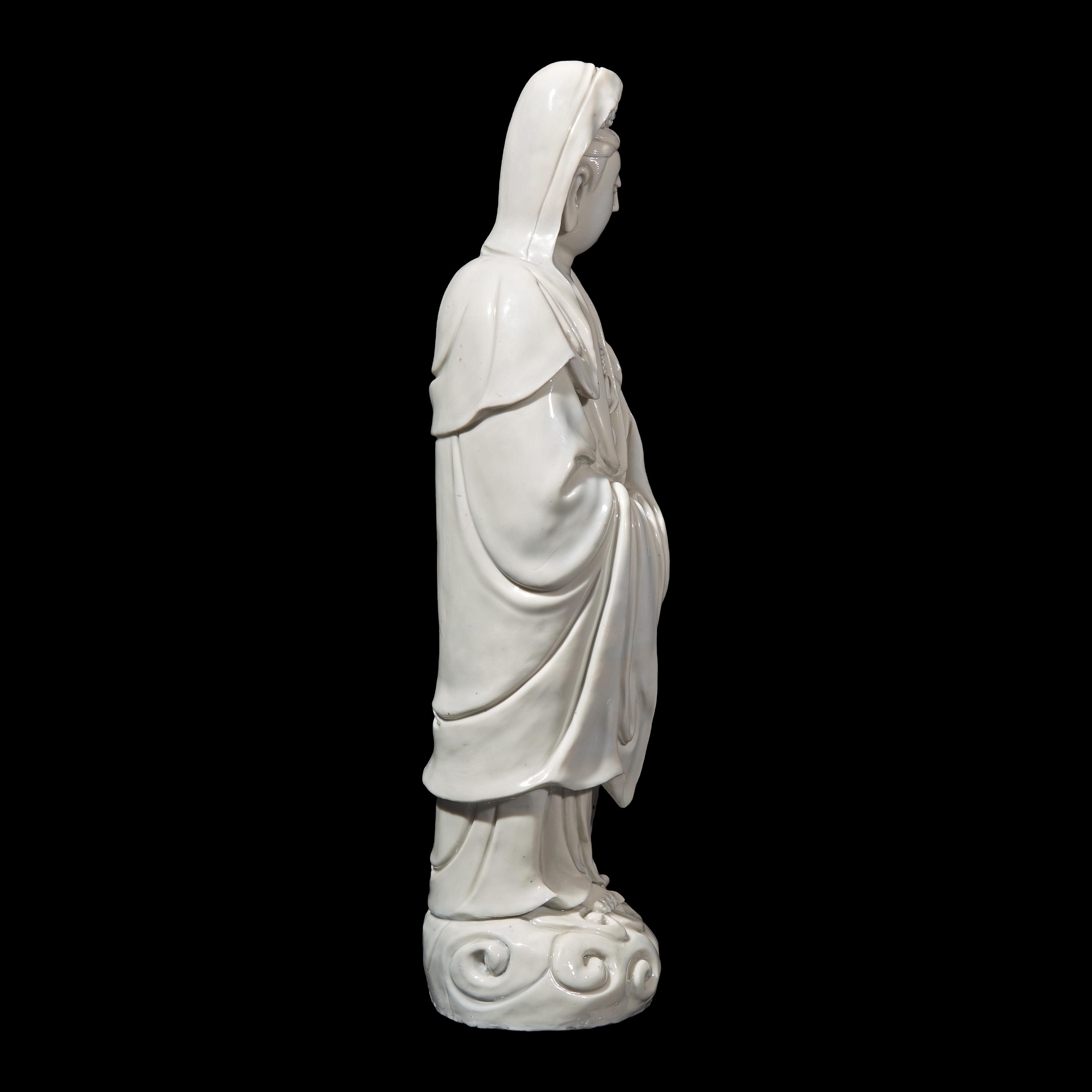 An Impressive Chinese Blanc de Chine Guanyin , Impressed Sunjiang Shanren M ark, 17th/18th Century 清早期 筍江山人款德化白瓷觀音立像