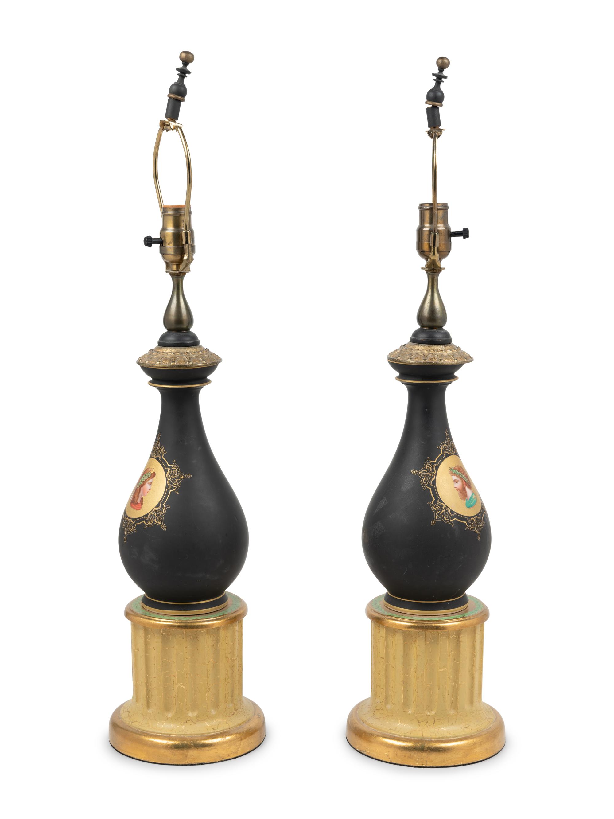 A Pair of Continental Porcelain and Giltwood Lamps