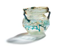 A Roman Pale Blue Glass Jar with Blue Spiral Trail