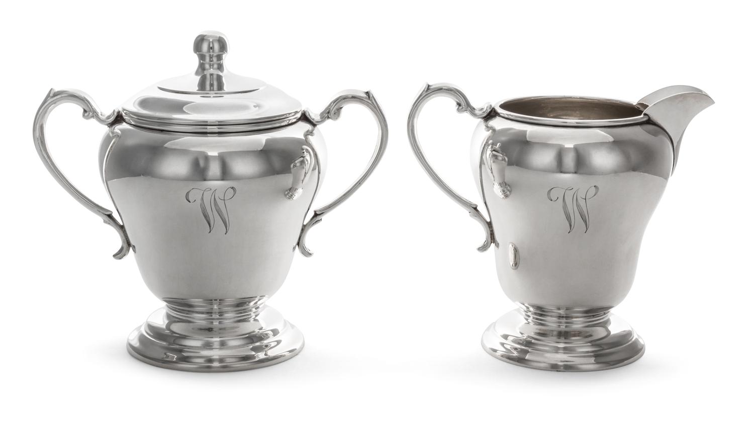 An American Silver Creamer and Covered Sugar Set, Manchester Silver Co., Providence, RI, 20th Century, each of baluster, handled form.