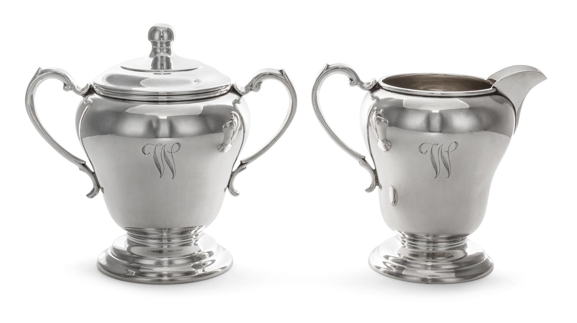An American Silver Creamer and Covered Sugar Set, Manchester Silver Co., Providence, RI, 20th Century, each of baluster, handled form.
