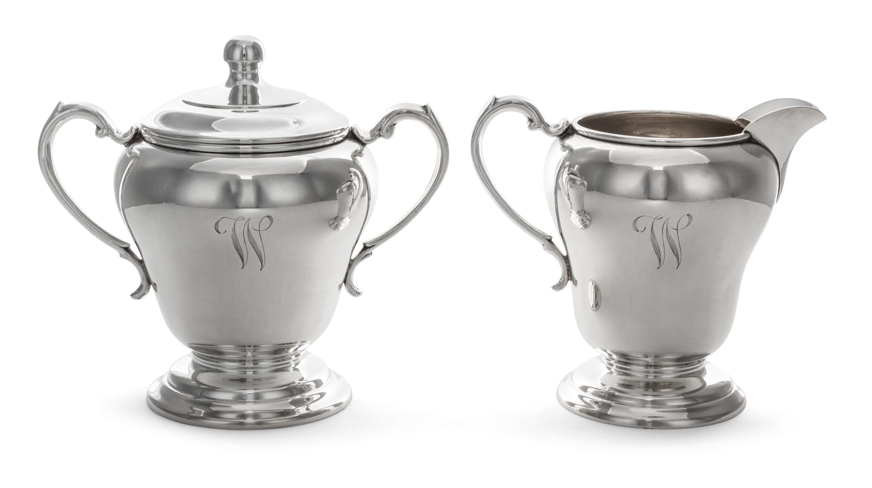 An American Silver Creamer and Covered Sugar Set, Manchester Silver Co., Providence, RI, 20th Century, each of baluster, handled form.