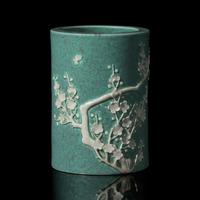 A Chinese "Robin's-Egg" Glazed Porcelain Brushpot, Qing Dynasty, Probably 19th Century — 清晚期 爐鈞釉貼塑梅花圖筆筒