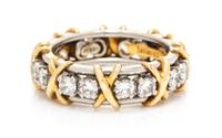 A Platinum and 18 Karat Yellow Gold Diamond "Sixteen Stone" Band, Jean Schlumberger for Tiffany & Co., 5.60 dwts.