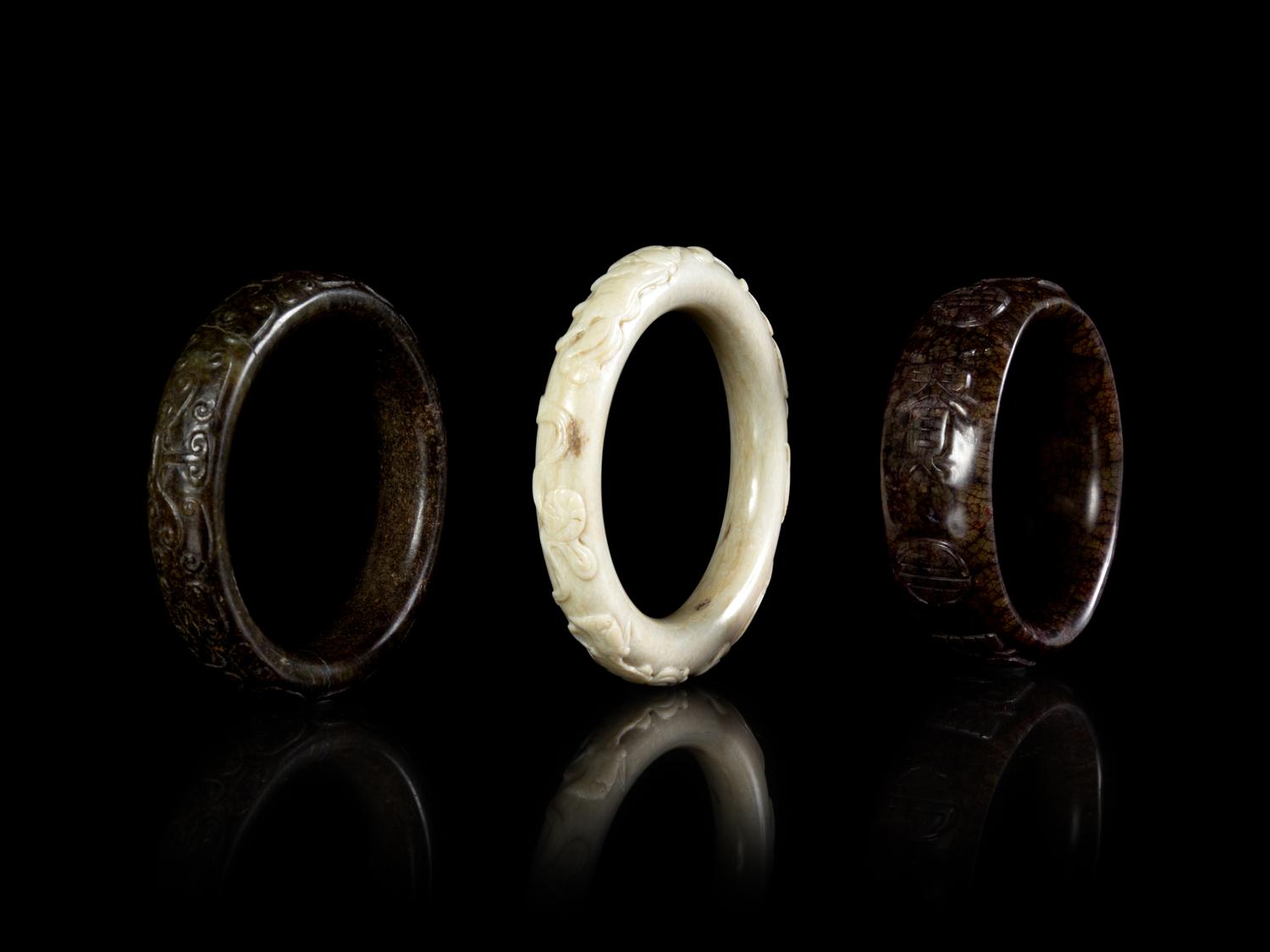 Three Carved Hardstone Bangles