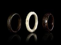 Three Carved Hardstone Bangles