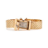 14K YELLOW GOLD AND DIAMOND BELT MOTIF SURPRISE WRISTWATCH