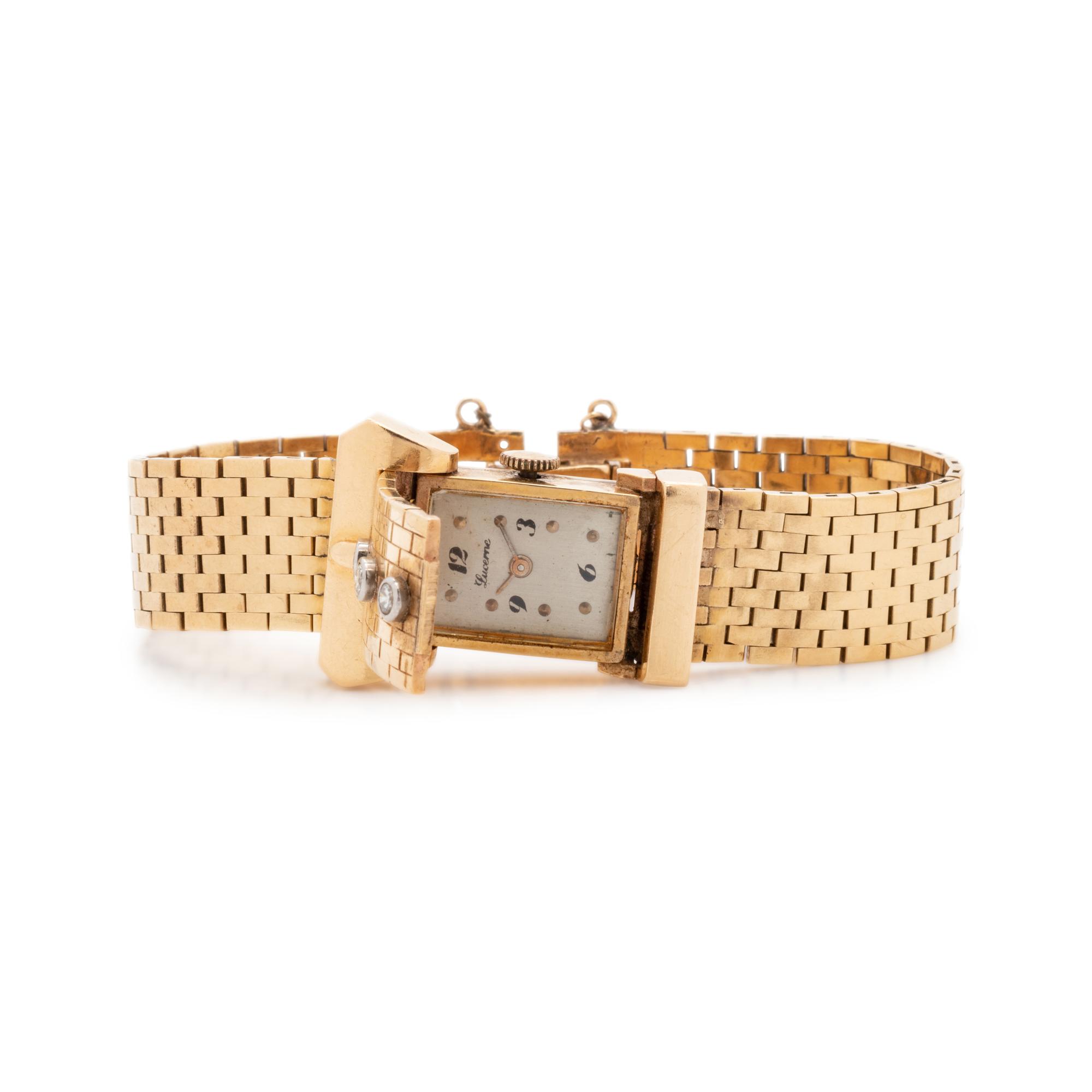 14K YELLOW GOLD AND DIAMOND BELT MOTIF SURPRISE WRISTWATCH