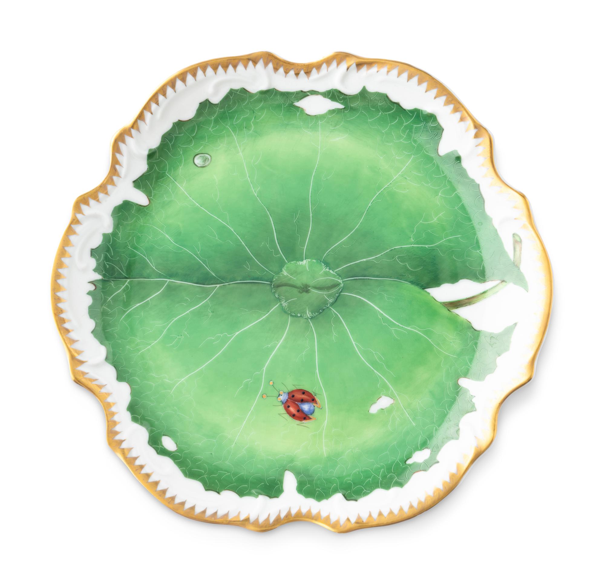 An Anna Weatherley Green Leaf Porcelain Dinner Service