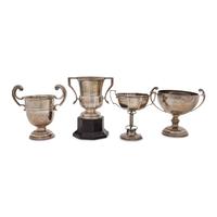 A Group of Four English Silver Twin-Handled Trophies