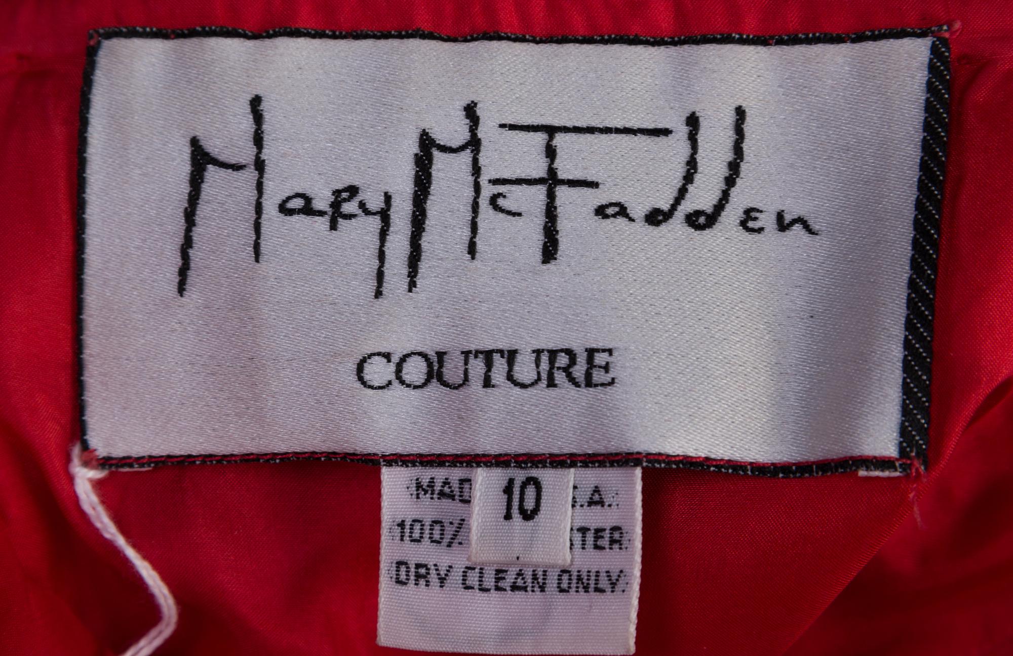 A Mary McFadden Coral Cocktail Dress, Size 10.