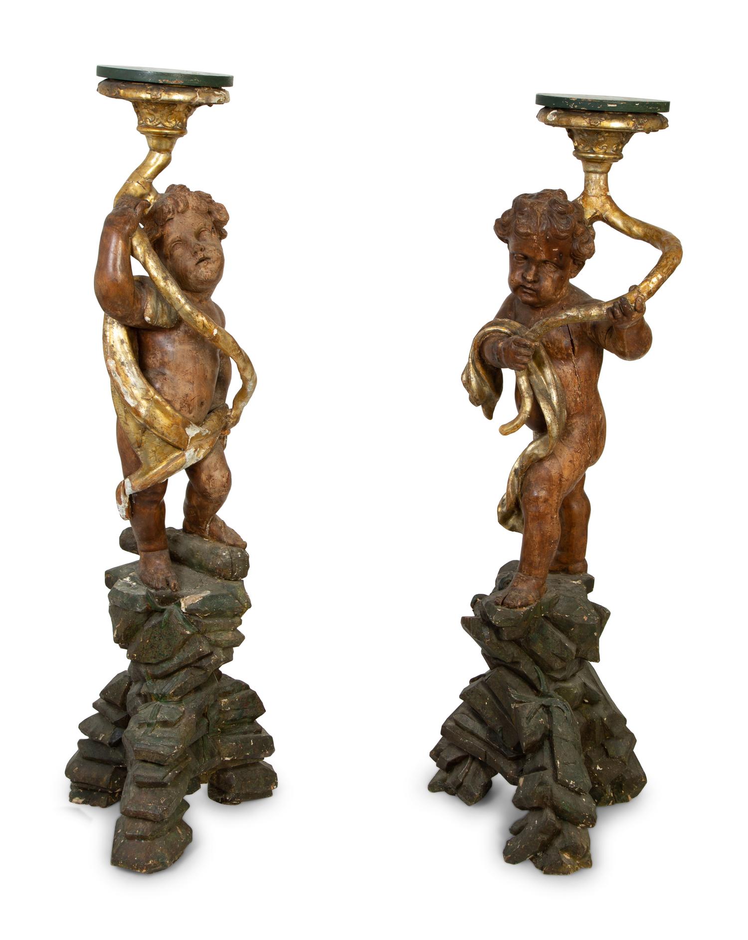 A Pair of Italian Painted and Parcel Gilt Figural Torcheres — 18TH CENTURY