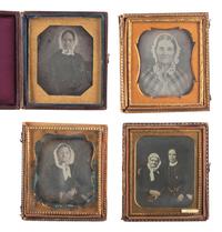 [EARLY PHOTOGRAPHY]. A group of 23 daguerreotype portraits of subjects of varying ages wearing eyeglasses, including: