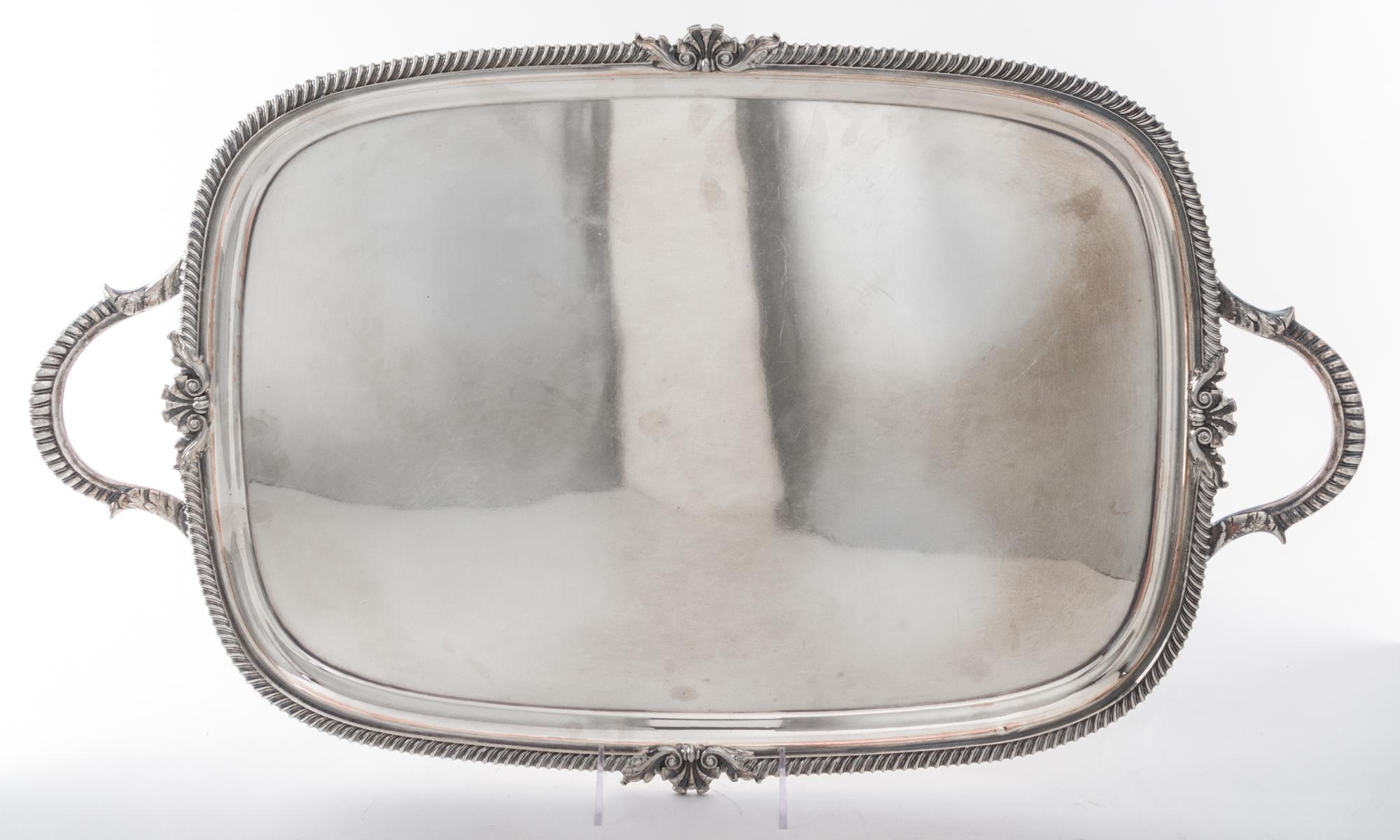 A Sheffield-plate Two-Handled Tray, , of rounded rectangular form and having a gadrooned border.