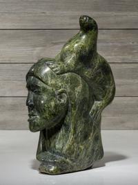 stone sculpture, woman and seal