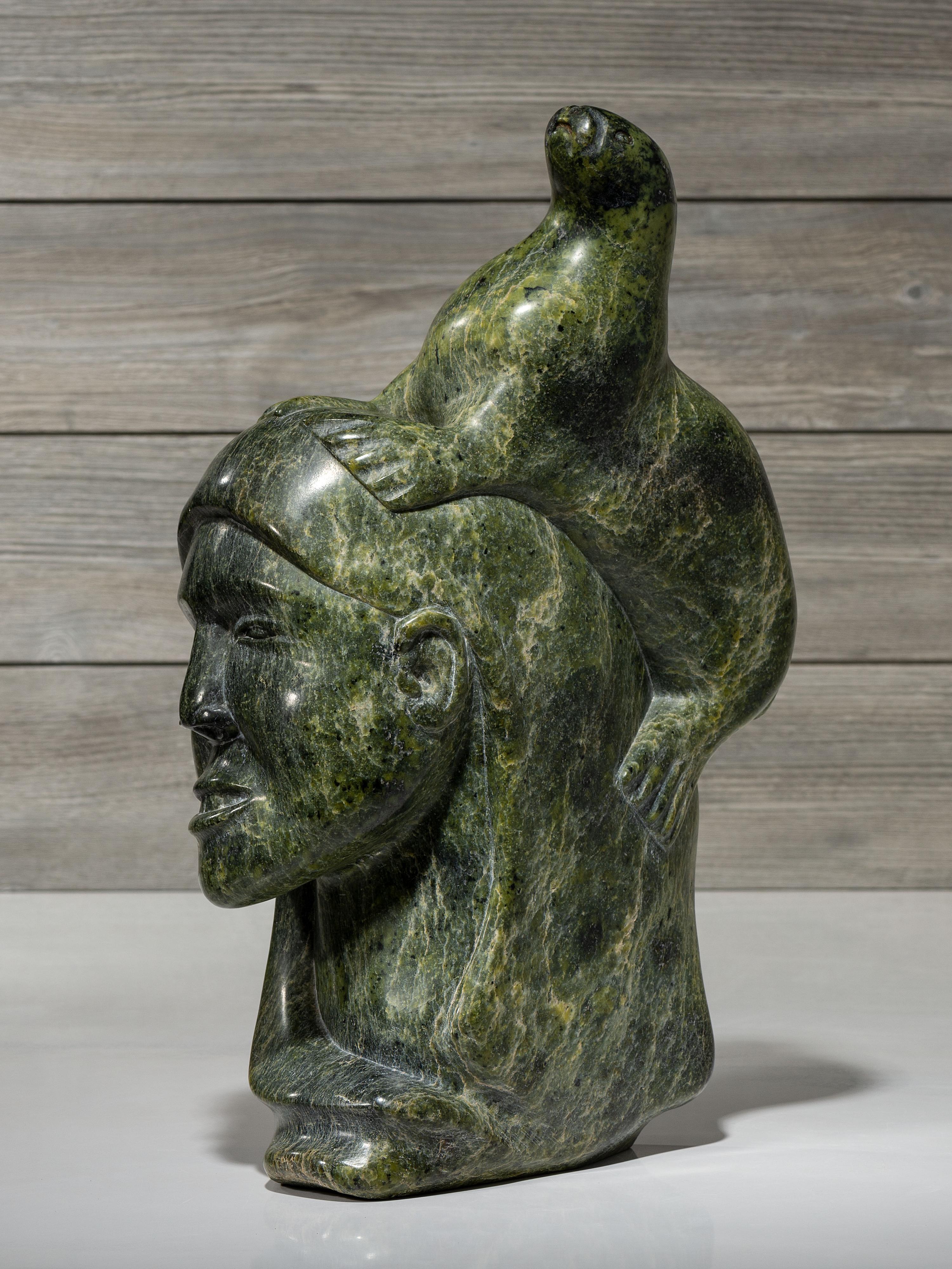 stone sculpture, woman and seal