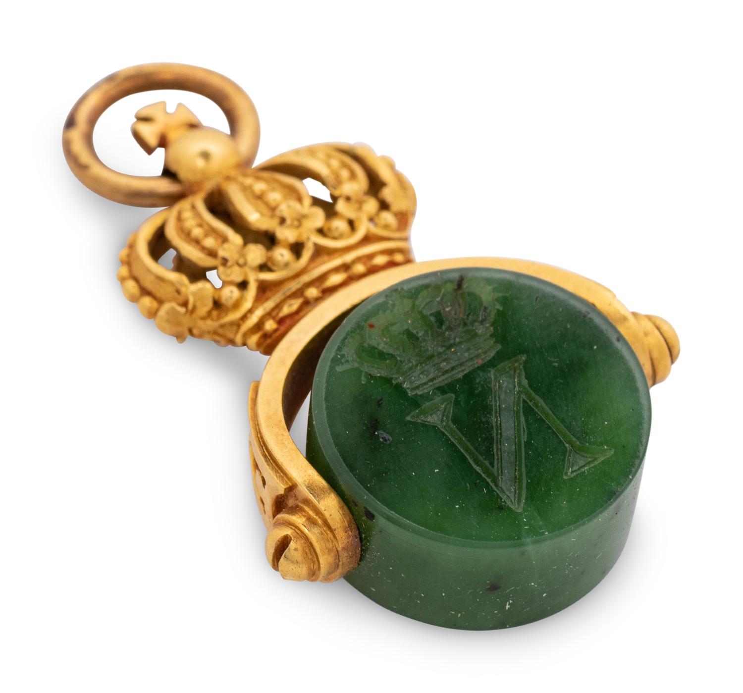 A Russian Yellow Gold and Carved Nephrite Swivel Seal