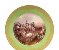 A Set of Four Limoges Porcelain Cabinet Plates