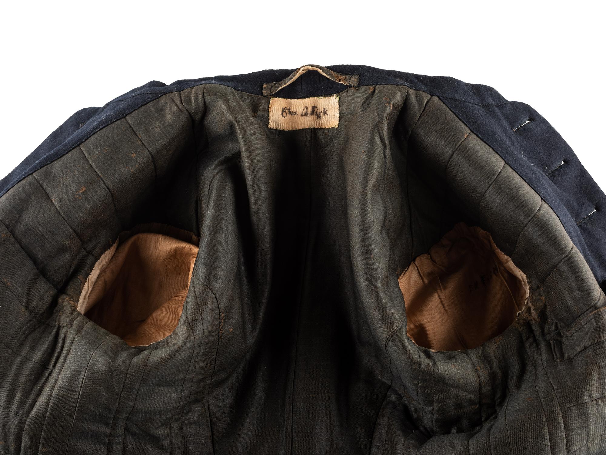 [CIVIL WAR]. Enlisted frock coat identified to Private Charles A. Fisk, 11th Massachusetts Infantry, WIA at Gettysburg.