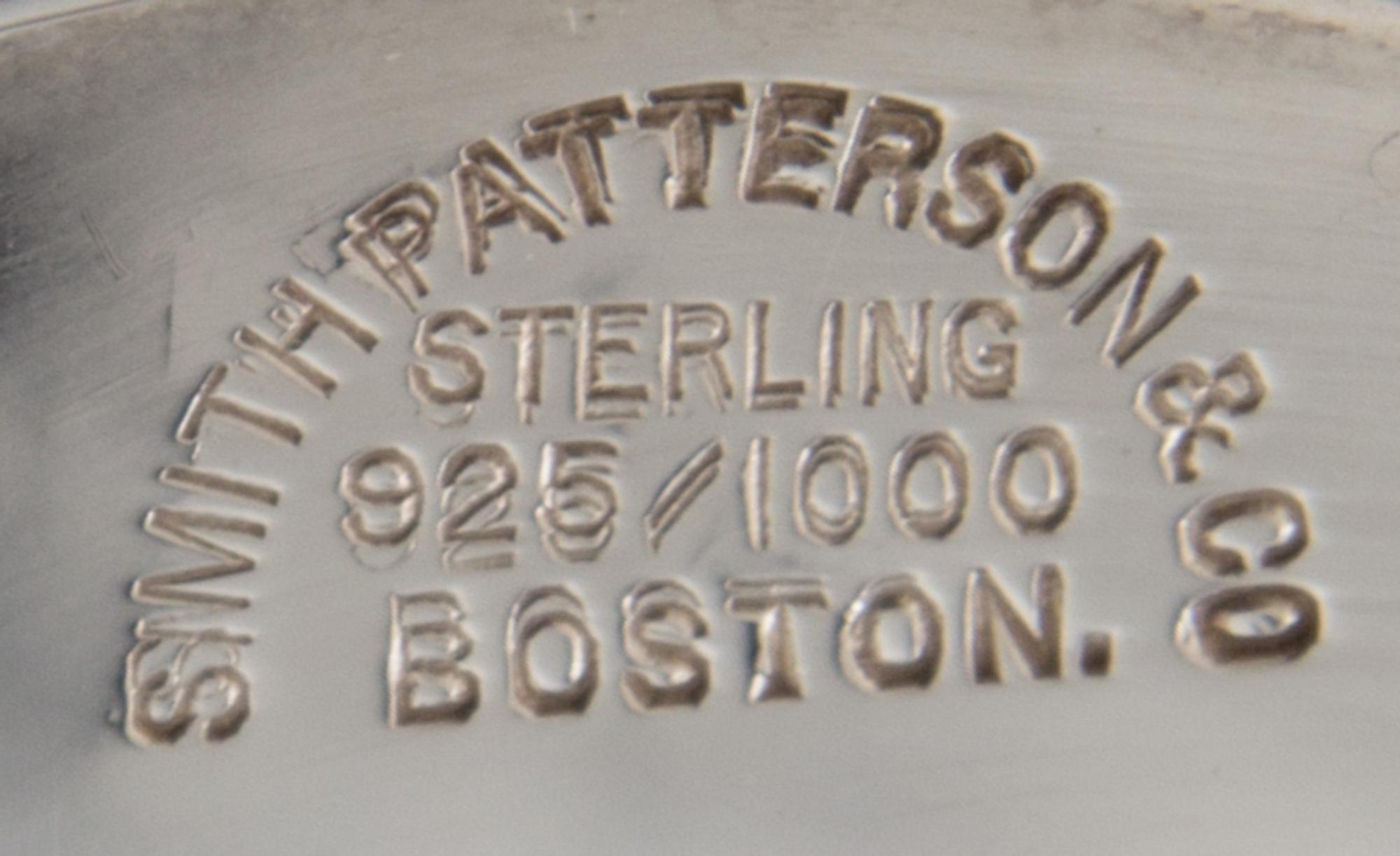 An American Silver Center Bowl, Smith, Patterson & Co., Boston, MA, of oval form with two foliate decorated handles, the body and base