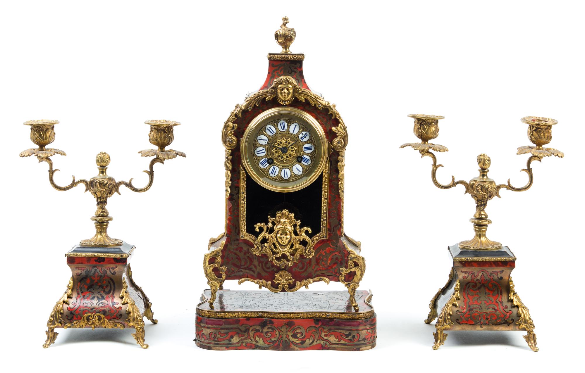 A Louis XV Style Boulle Marquetry Clock Garniture Height of clock overall 17 1/4 inches. — LATE 19TH CENTURY