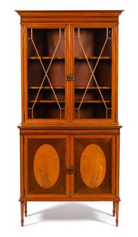 An Edwardian Inlaid Satinwood Breakfront Bookcase Height 82 1/2 x width 39 1/2 x depth 16 1/4 inches. — 19TH CENTURY