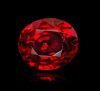 An 11.58 Carat Oval Mixed Cut Burmese Red Spinel, 4.30 dwts. (with setting)