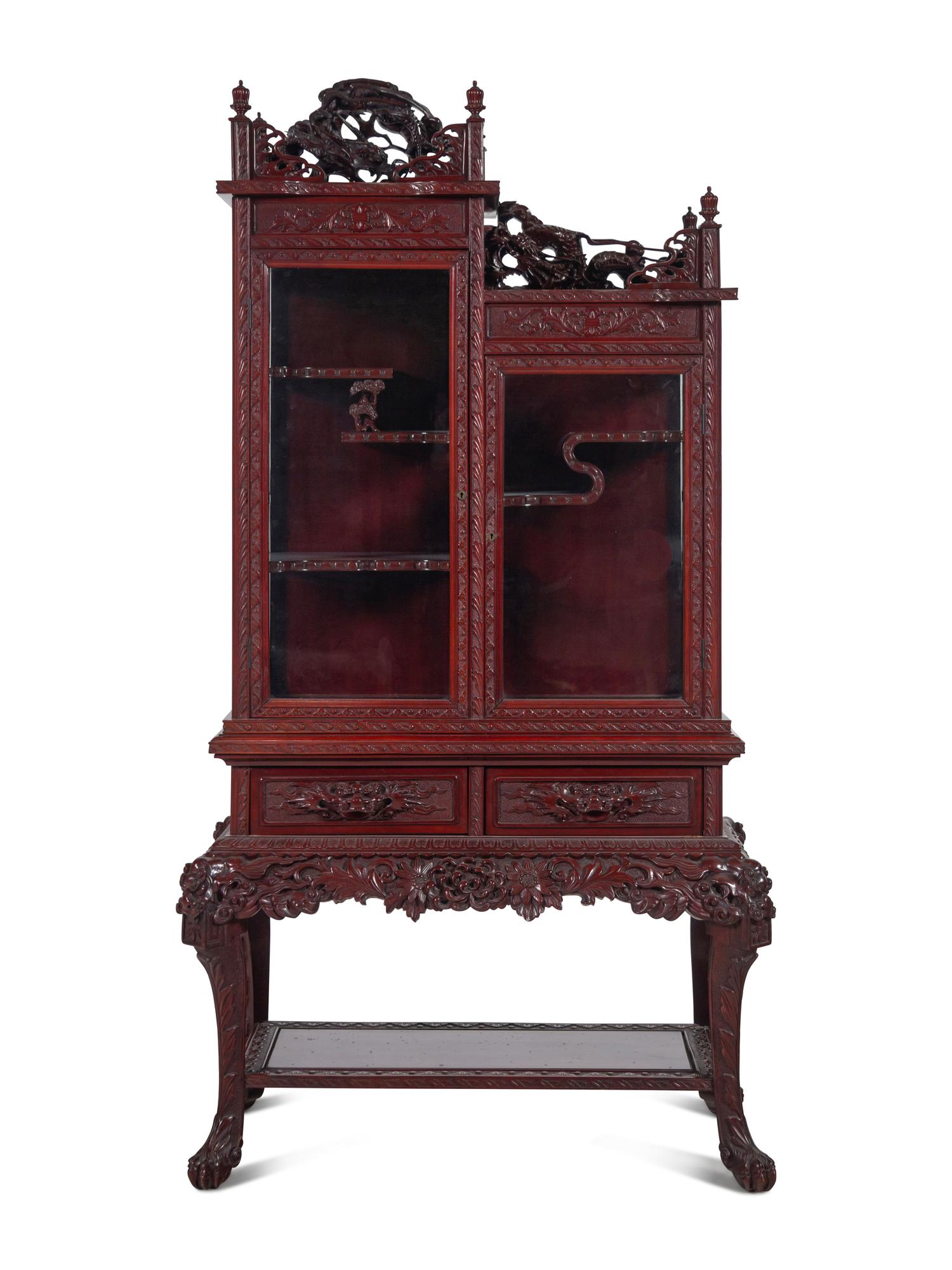 A Japanese Export Carved Hardwood Displaying Cabinet
