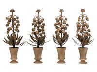 A Set of Four Topiary-Form Candlesticks