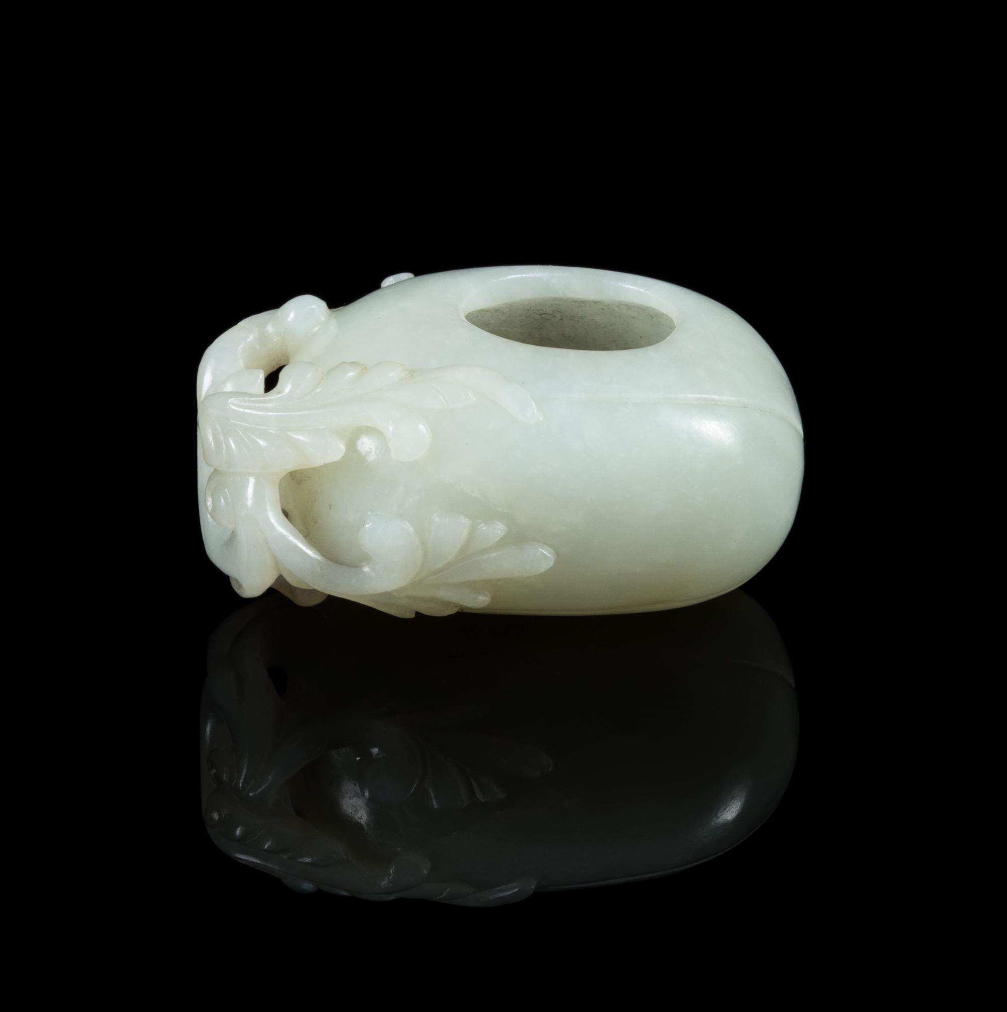 A Pale Celadon Jade 'Melon' Water Coupe Length 2 3/8 inches. — 19TH CENTURY