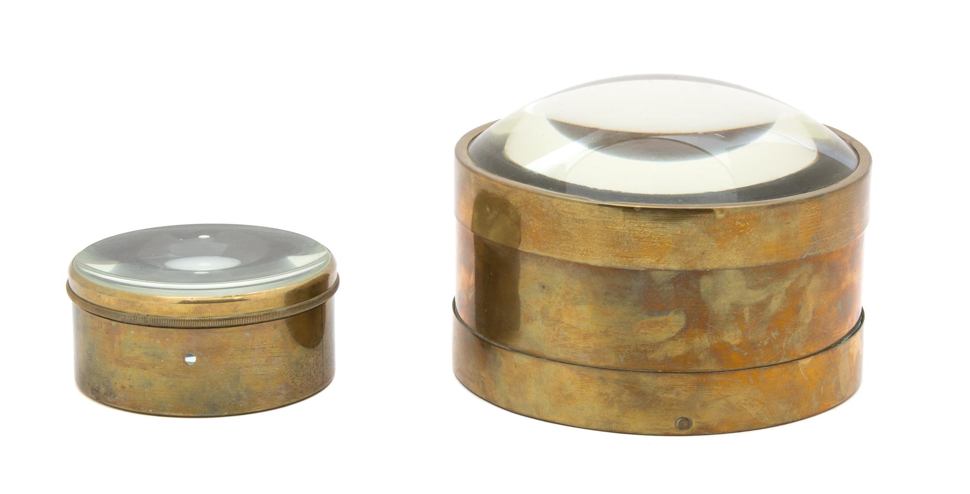 Two English Brass Cased Desk Magnifying Glasses Diameter of larger 6 5/8 inches. — 19TH CENTURY