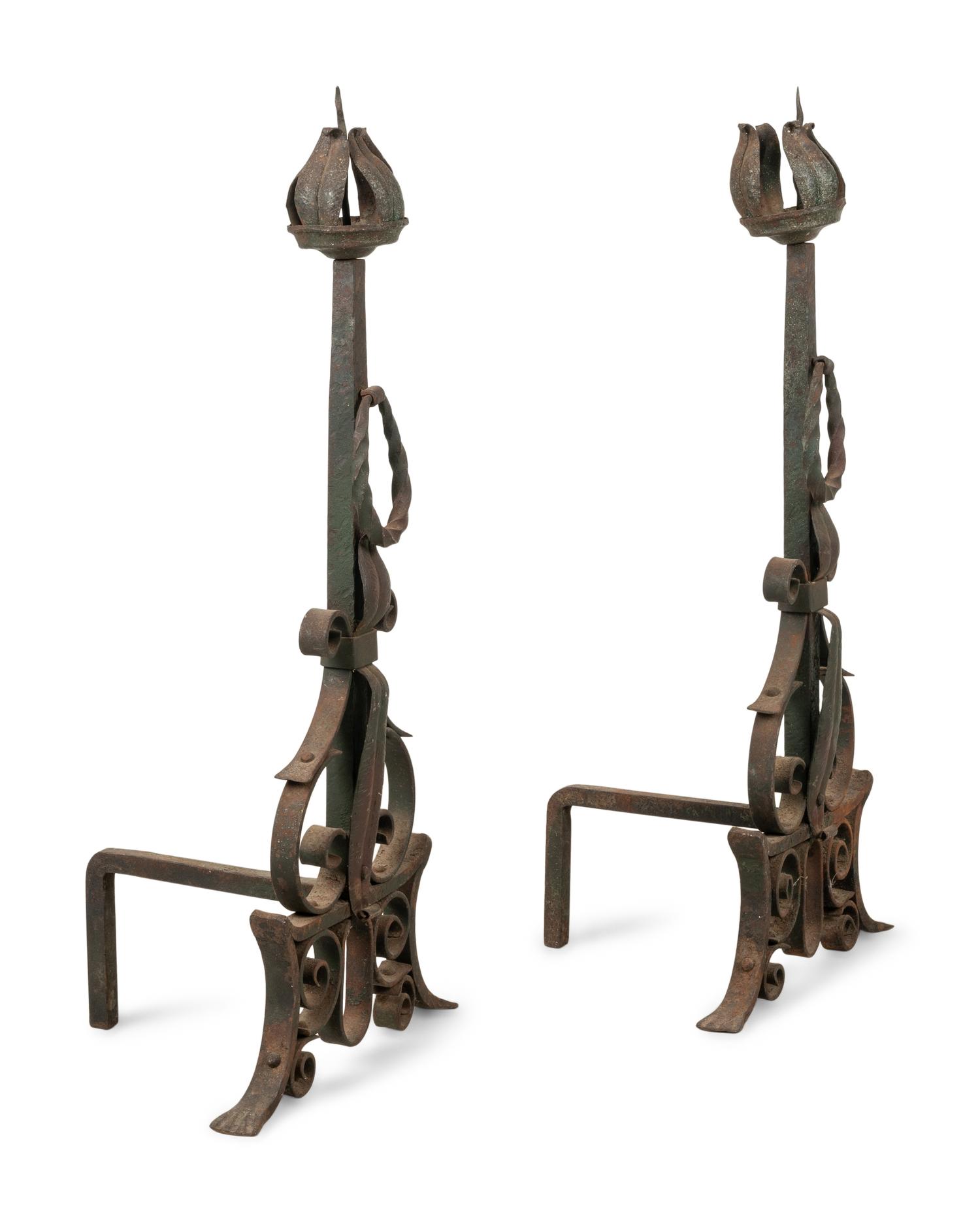 A Pair of Continental Iron Andirons