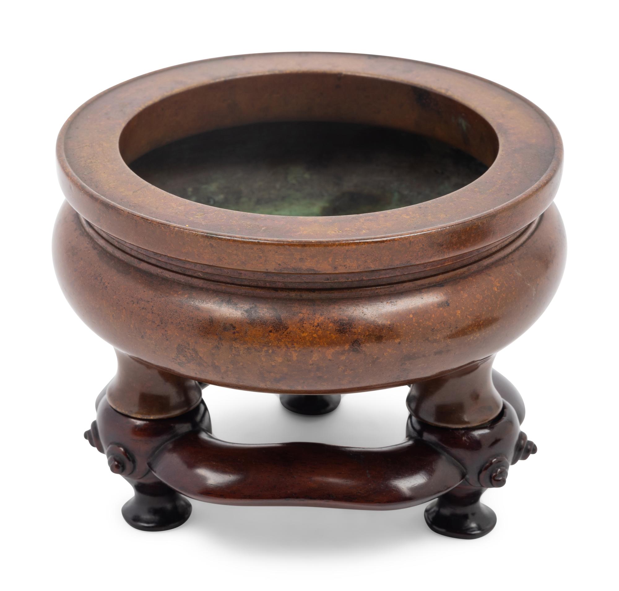 A Chinese Bronze Tripod Incense Burner