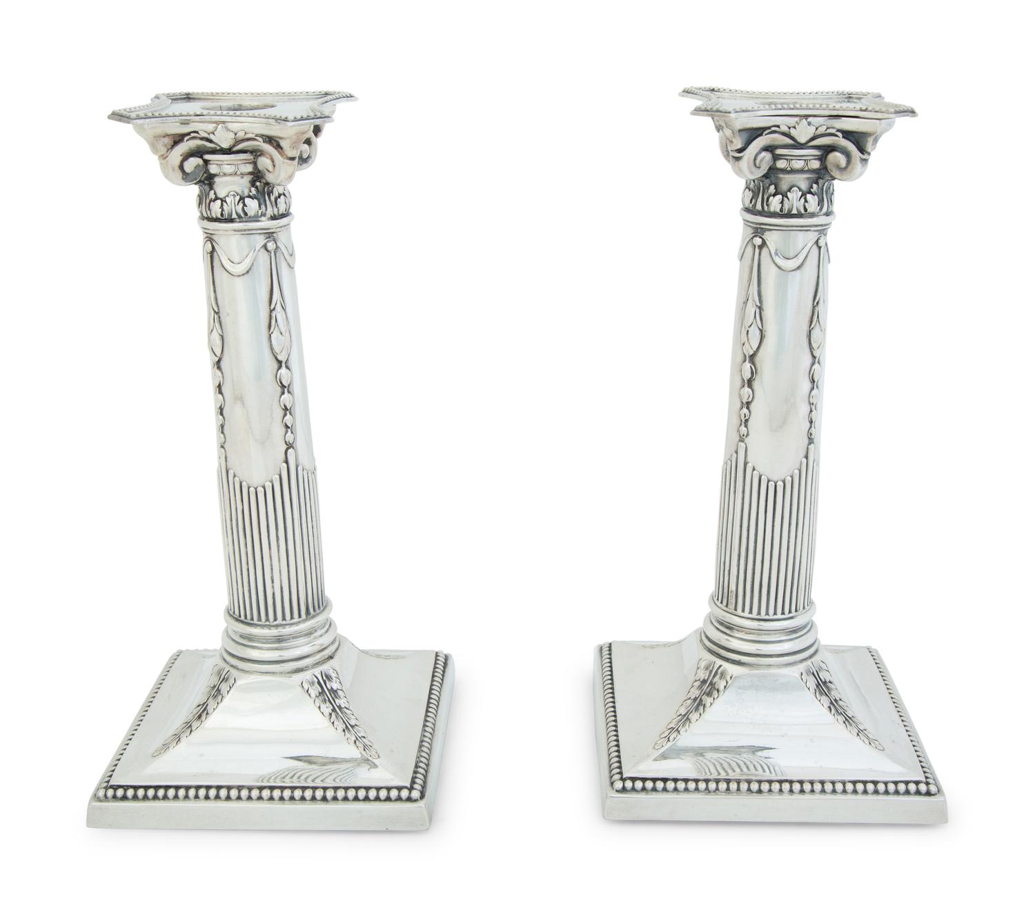 A Pair of German .800 Silver Candlesticks