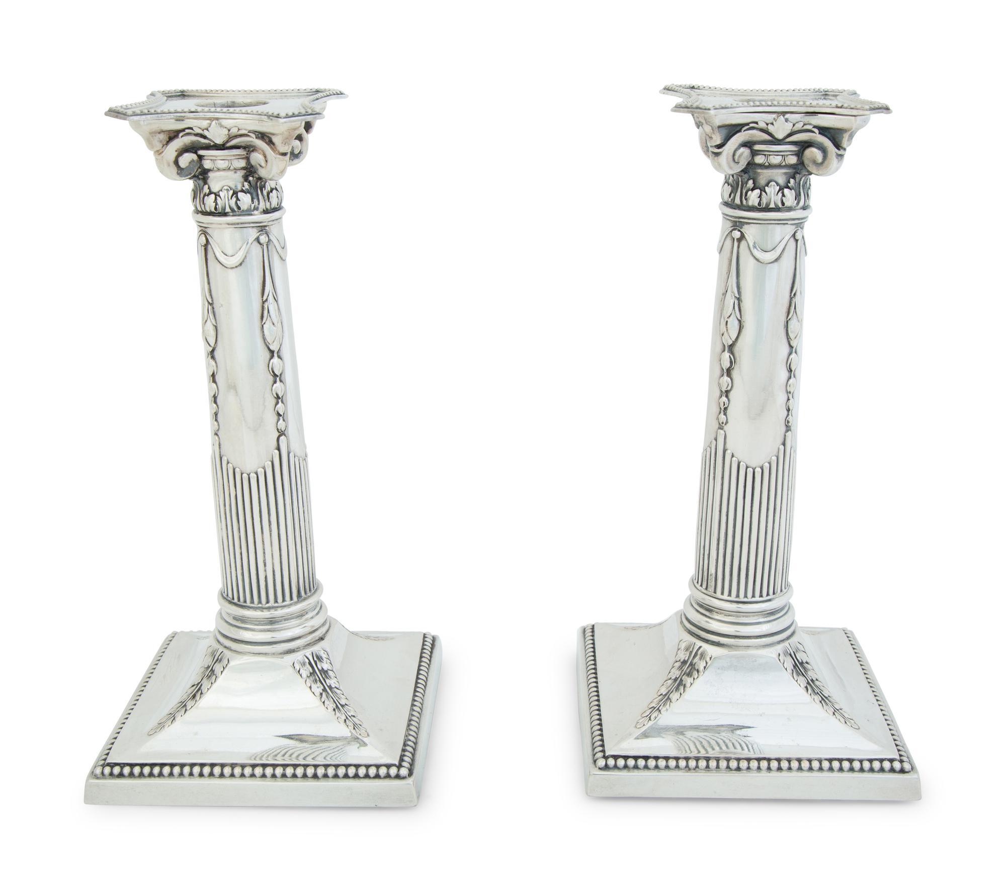 A Pair of German .800 Silver Candlesticks
