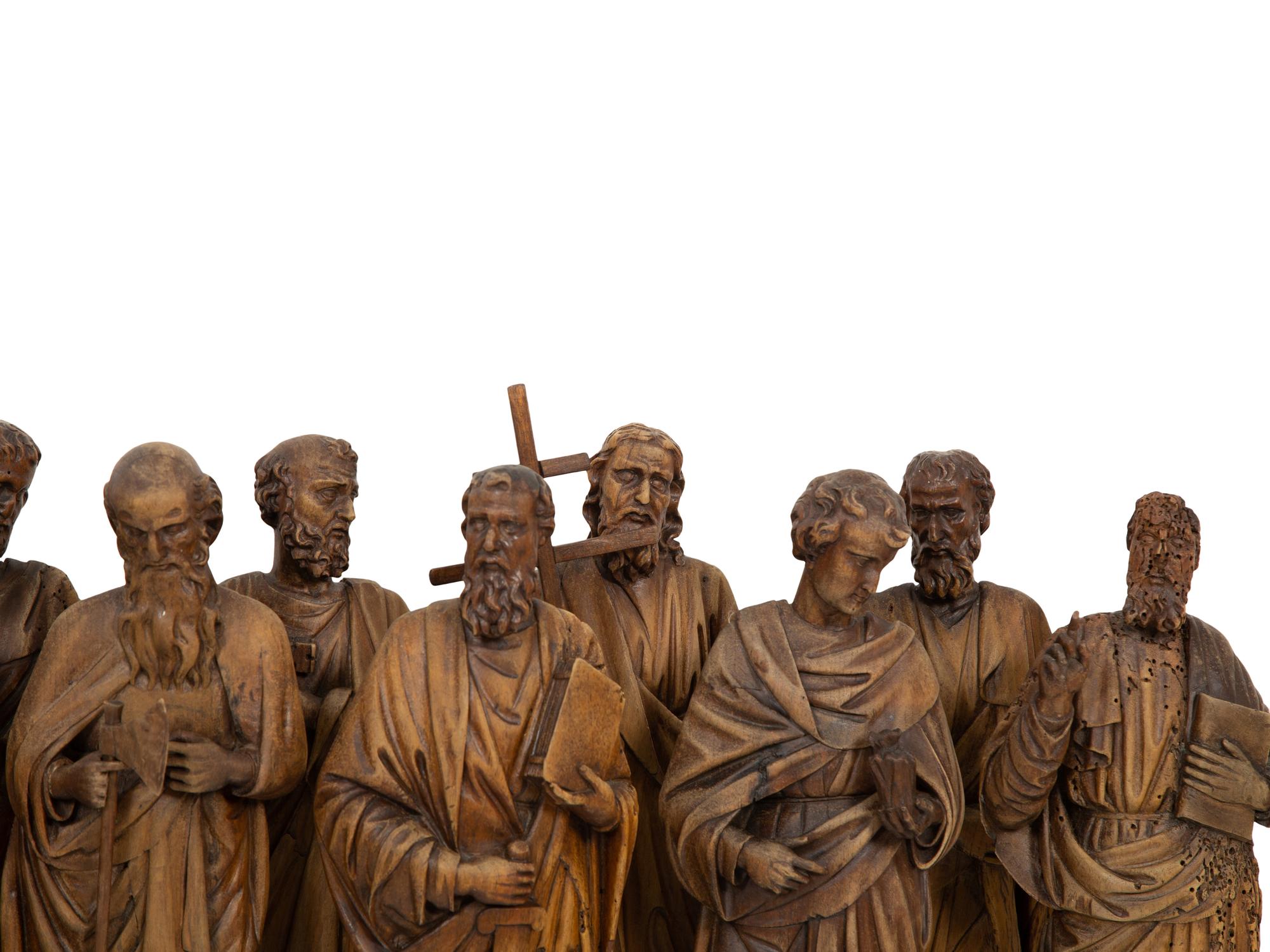 A Set of Twelve Continental Carved Walnut Figures of Apostles