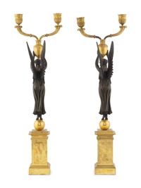 A Pair of Empire Style Gilt and Patinated Bronze Figural Two-Light Candelabra