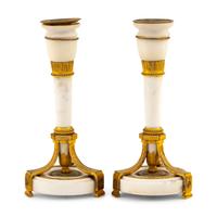 A Pair of Directoire Gilt Bronze and White Marble Candlesticks