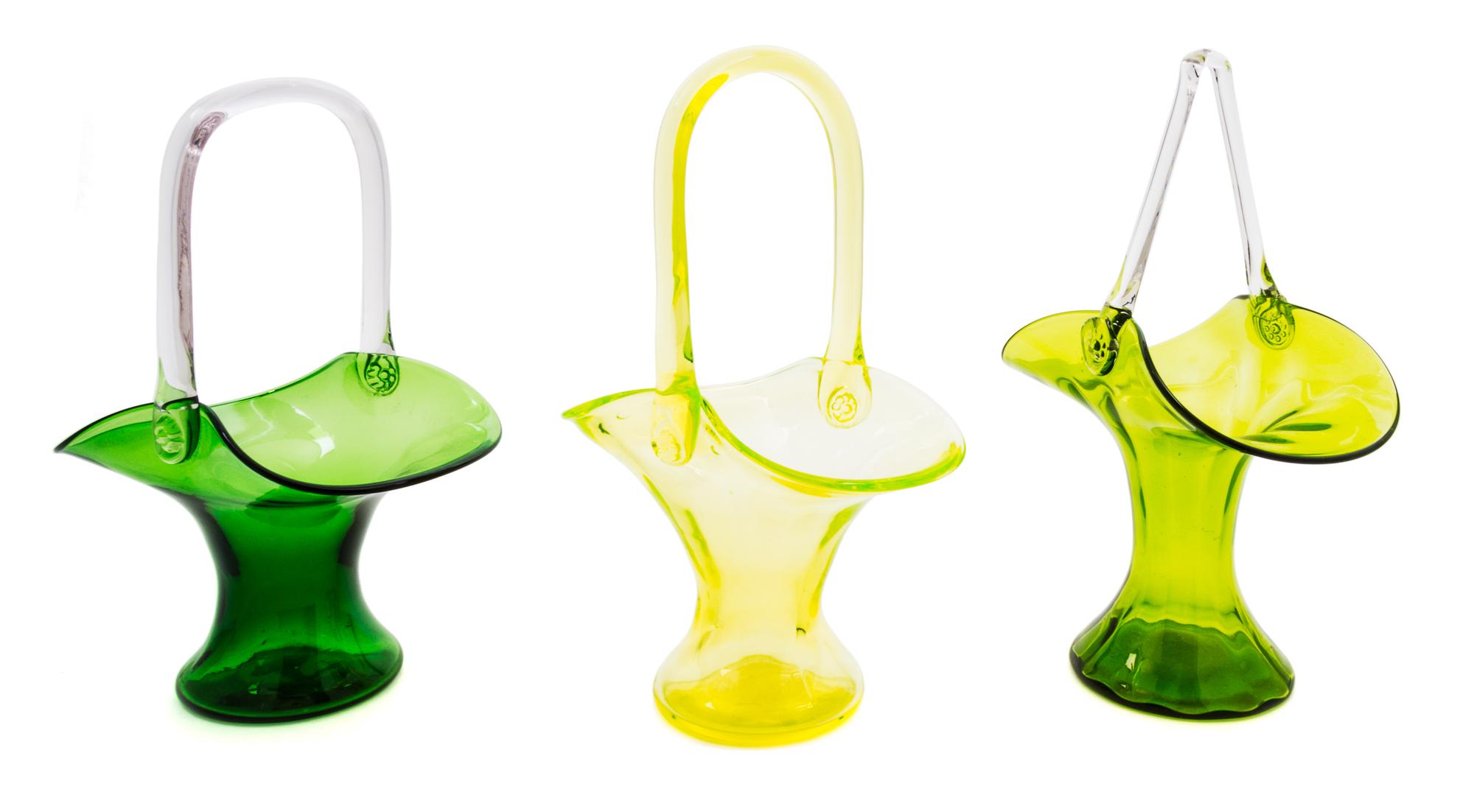 Three Glass Baskets Height of tallest 11 7/8 inches.