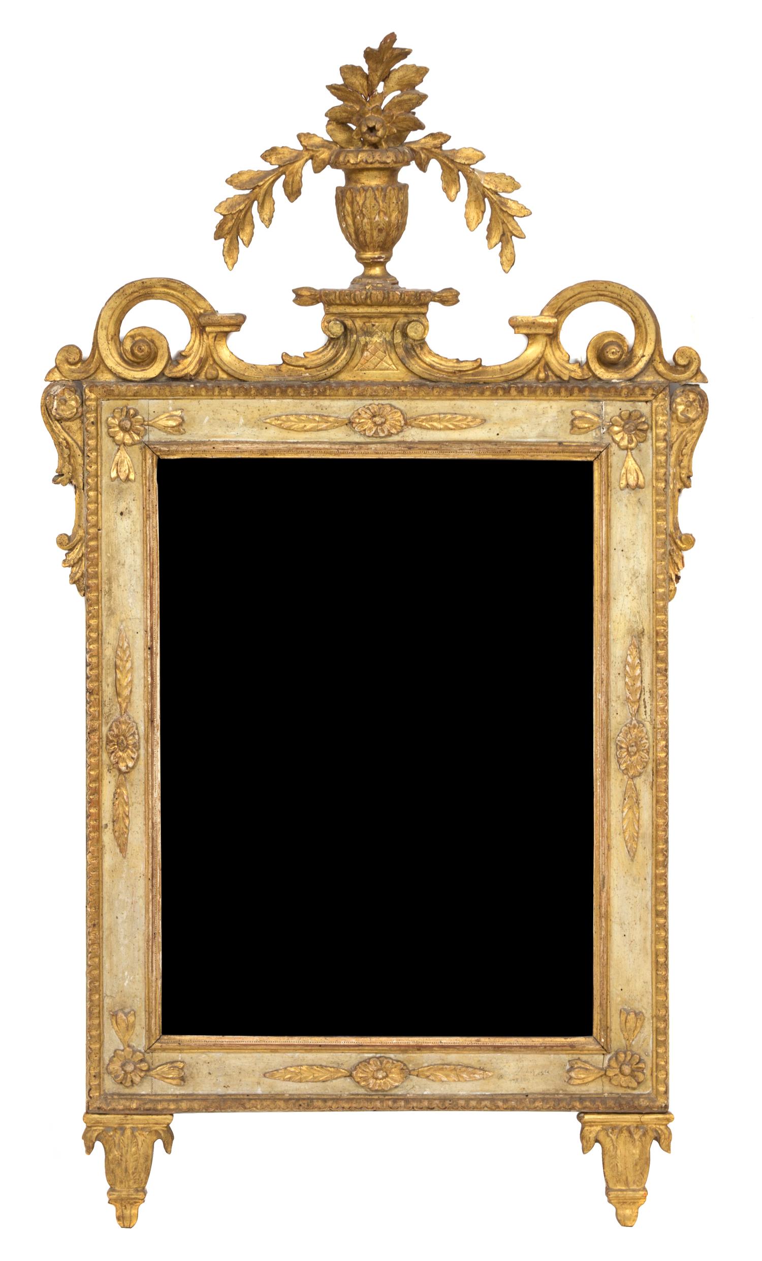 A Louis XVI Style Carved and Parcel Gilt Mirror Height 49 x width 26 inches. — 19TH CENTURY